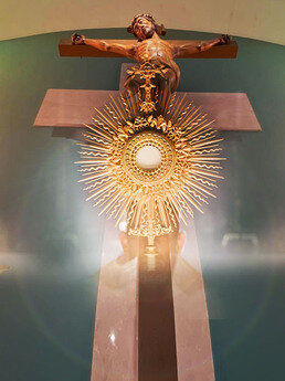 Altar, cross, eucharist