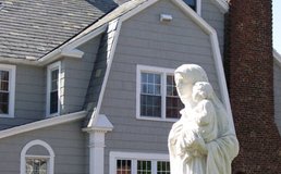 statue of mary and child outside church