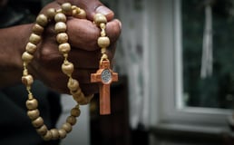 Holding Rosary