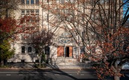 exterior of front door with fall trees and leaves