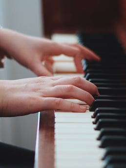 hands on piano keys