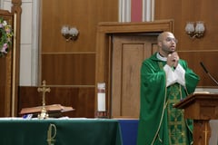Catholic priest celebrating Mass