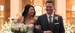 bride and groom walking down aisle