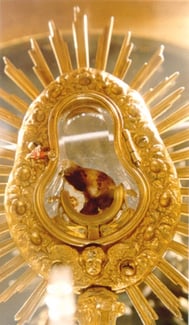 close-up of a monstrance holding a host with blood on it